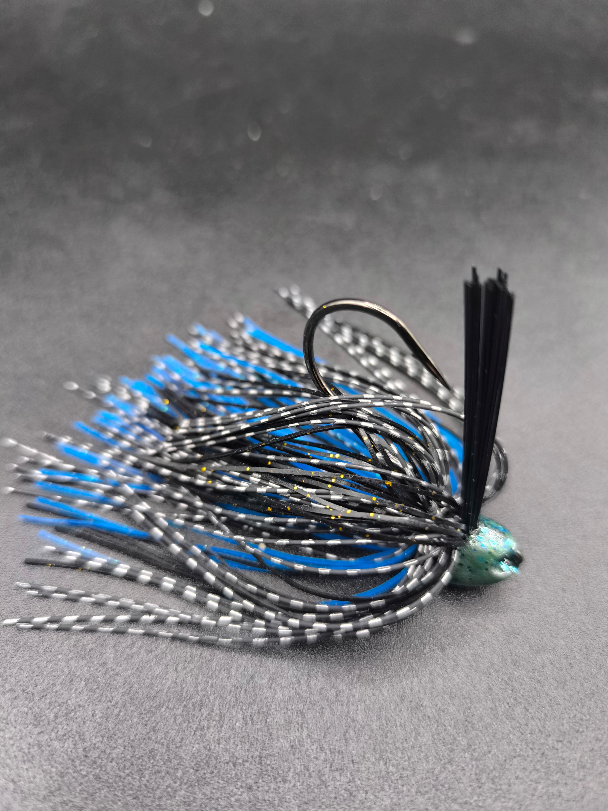 stand-up-brush-jig-black-blue-lobster-detail
