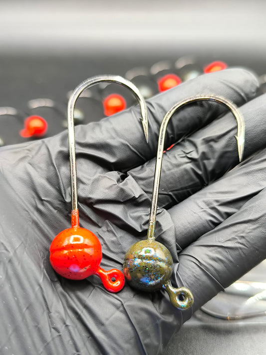 Tête plombée ronde Big Game avec hameçon 6/0 à 8/0 pour gros leurres souples, idéale pour la pêche du brochet et des gros carnassiers.